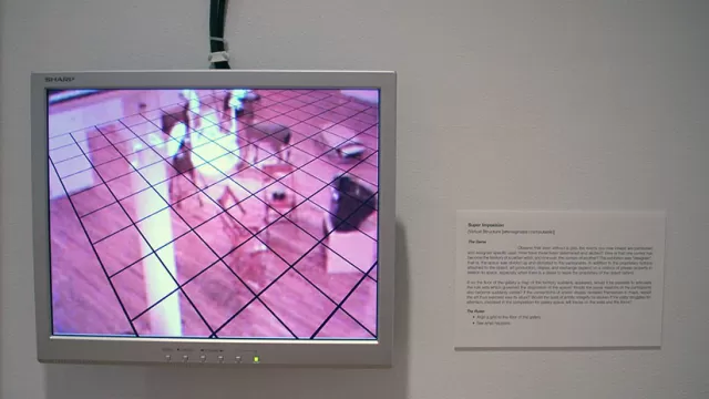 Installation View: A monitor with room image and superimposed grid.