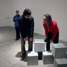 Lifting the blocks into the machine.