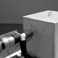 The machine carving.